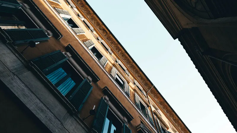 Teal Shutters on Historic Facade